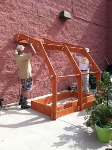 10-18-15GaryandMichaelliftingEntryArch